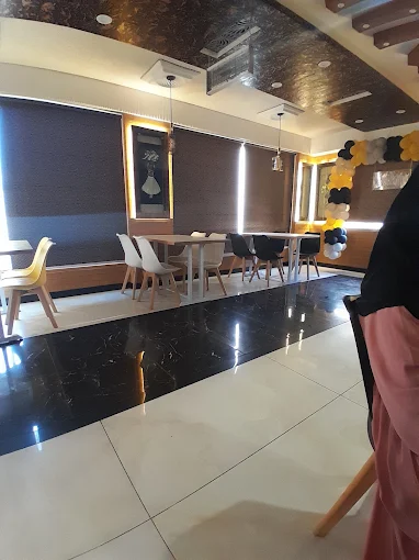 meer jee restaurant seating area Bhittai Colony Korangi
